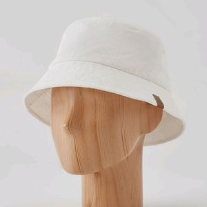 White bucket hat